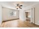 Bedroom with ceiling fan and view of winter trees at 3082 S Wheeling Way # 203, Aurora, CO 80014