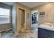 Bathroom featuring double sinks, a walk-in closet, toilet, and natural light at 5837 High Timber Cir, Castle Rock, CO 80104