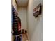Practical mudroom entrance features coat hooks, storage, and durable wood flooring at 5837 High Timber Cir, Castle Rock, CO 80104
