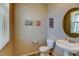 Well-lit powder room featuring a pedestal sink and decorative accents at 5837 High Timber Cir, Castle Rock, CO 80104