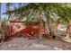 Cozy backyard seating area with comfortable furniture, perfect for outdoor relaxation at 23626 Genesee Village Rd, Golden, CO 80401