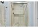 Tiled walk-in shower features tile surround, glass doors and tiled flooring at 23626 Genesee Village Rd, Golden, CO 80401
