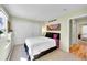 This bright bedroom offers ample closet space, large windows, and modern lighting at 23626 Genesee Village Rd, Golden, CO 80401