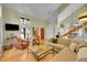 Spacious living room with large windows, stylish furnishings, and an open floor plan at 23626 Genesee Village Rd, Golden, CO 80401