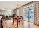 Charming dining area with sliding glass doors leading to an outdoor deck at 240 Corby Pl, Castle Pines, CO 80108