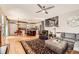 Open concept living space with kitchen, living room, and dining area flowing together at 240 Corby Pl, Castle Pines, CO 80108