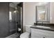 Modern bathroom featuring a glass-enclosed shower, stylish vanity, and contemporary fixtures for a spa-like experience at 991 E Applewood Ave, Centennial, CO 80121