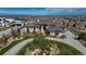 Beautiful home with a circular driveway and lush landscaping in a desirable neighborhood at 703 Emberglow Ln, Highlands Ranch, CO 80126