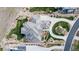 Aerial view of a luxury estate showcasing the unique roof design and landscaped grounds at 703 Emberglow Ln, Highlands Ranch, CO 80126