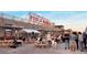 Local public market with outdoor seating area for live music and dining, enhancing the community experience at 1242 Yates St # U2, Denver, CO 80204