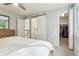 Bright main bedroom with a closet and a view overlooking the backyard at 7061 Palisade Dr, Highlands Ranch, CO 80130