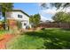 Green backyard featuring a shed and a pergola at 927 Quartz Ct, Longmont, CO 80504