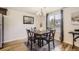 Cozy dining area with hardwood floors and a window view at 927 Quartz Ct, Longmont, CO 80504