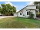 Ranch style home with attached garage and nicely landscaped lawn at 927 Quartz Ct, Longmont, CO 80504