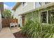 Inviting front entrance with a sitting area and landscaping at 927 Quartz Ct, Longmont, CO 80504