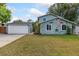 Attached garage with a large driveway and plenty of parking at 927 Quartz Ct, Longmont, CO 80504