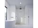 Modern bathroom showcasing a glass-enclosed shower and a freestanding tub with modern fixtures at 680 Lone Eagle Dr, Granby, CO 80015