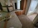 Bathroom featuring dual sinks, spacious countertop and oak cabinetry at 2619 S Iris Ct, Lakewood, CO 80227
