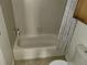 A clean bathroom with a shower-tub combination and essential toiletries at 2619 S Iris Ct, Lakewood, CO 80227