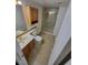 Functional bathroom with a vanity, toilet, and shower, designed for convenience and everyday use at 2619 S Iris Ct, Lakewood, CO 80227