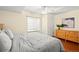 Bedroom with wooden floors, neutral paint, one window, and a ceiling fan at 132 Mesa St, Brighton, CO 80601