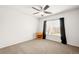 Bedroom with neutral paint, carpeted floors, one window and a ceiling fan at 132 Mesa St, Brighton, CO 80601