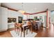 Open-concept kitchen dining area features a modern design with stainless steel appliances and a spacious layout at 132 Mesa St, Brighton, CO 80601