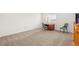 Second floor flex space, carpeted, offers privacy for a home office at 132 Mesa St, Brighton, CO 80601