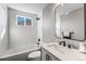 Bright bathroom featuring a shower-tub combination with subway tile and modern fixtures at 12018 Hudson Ct, Thornton, CO 80241