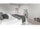 Stylish bedroom with ensuite bathroom access at 12018 Hudson Ct, Thornton, CO 80241