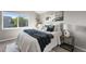 Bedroom with soft textures and bright natural light at 12018 Hudson Ct, Thornton, CO 80241