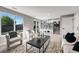 Bright living room showcases modern decor, large windows, and an open-concept design at 12018 Hudson Ct, Thornton, CO 80241