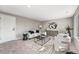 Modern living room with comfortable seating, stylish decor, and ample natural light at 12018 Hudson Ct, Thornton, CO 80241