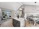 Living space with view from kitchen and stairs at 12018 Hudson Ct, Thornton, CO 80241