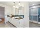 Bathroom featuring a wide vanity with a dark countertop and a glass-enclosed shower at 1118 Eagle Rd, Broomfield, CO 80020