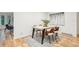 Dining room with hardwood floors, modern lighting, and contemporary decor at 1118 Eagle Rd, Broomfield, CO 80020