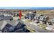 An aerial view of the property showing the house and surrounding neighborhood at 700 Lillibrook Pl, Erie, CO 80026