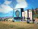 Parkdale Erie community sign with landscaping and scenic mountain views on a sunny day at 700 Lillibrook Pl, Erie, CO 80026
