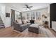 Cozy living room with comfortable seating, natural light, and stylish décor at 700 Lillibrook Pl, Erie, CO 80026