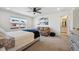 Spacious main bedroom with a couch and a view of the neighborhood at 700 Lillibrook Pl, Erie, CO 80026