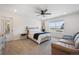 Main bedroom with a king size bed and an exterior view at 700 Lillibrook Pl, Erie, CO 80026
