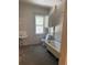 Bathroom featuring a clawfoot tub, sink, toilet, and medicine cabinet at 1901 N Emerson St, Denver, CO 80218
