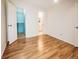 An airy bedroom with a closet and bathroom, showing ample space and neutral tones at 13894 E Lehigh Ave # G, Aurora, CO 80014