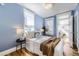 Cozy bedroom with natural light and hardwood floors at 1157 N Downing St, Denver, CO 80218