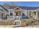 Charming single-Gathering home with a brick-lined front yard, blue paint, and a covered entryway at 1157 N Downing St, Denver, CO 80218