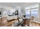 Bright living and dining area with hardwood floors and natural light at 1157 N Downing St, Denver, CO 80218