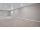 Large unfinished basement with a window and carpeted floor at 3432 N Gold Bug Ct, Aurora, CO 80019