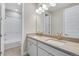 Elegant bathroom with double vanity and a shower/tub combo at 3432 N Gold Bug Ct, Aurora, CO 80019