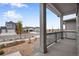 Covered front porch with view of landscaped yard and neighborhood at 3432 N Gold Bug Ct, Aurora, CO 80019