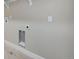 Functional laundry room with utility hookups and shelving at 3432 N Gold Bug Ct, Aurora, CO 80019